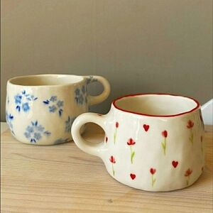 Now selling handpainted mugs plates and sets.